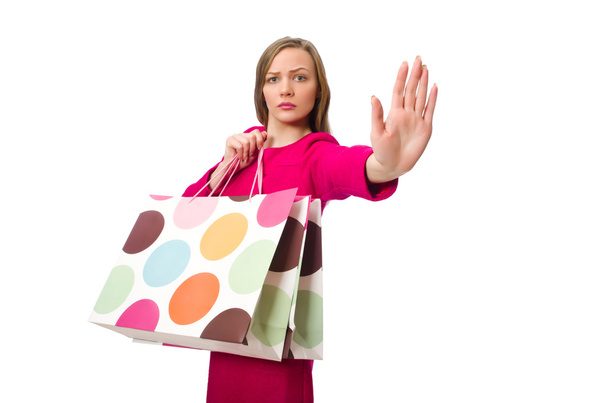 Bevásárló lány rózsaszín ruha gazdaság műanyag zacskók - Fotó, kép