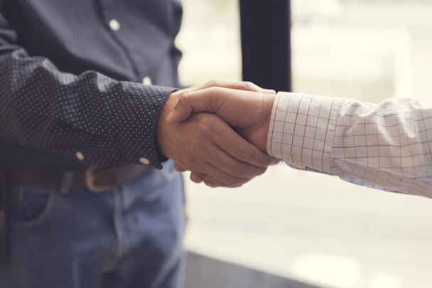 businessman handshaking for business acquisiton concept - Foto, afbeelding