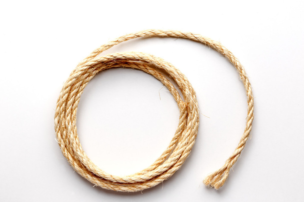 coiled rope on a white background close up - 写真・画像