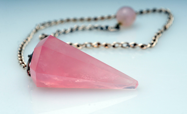 Rose quartz new age pendulum - Photo, Image