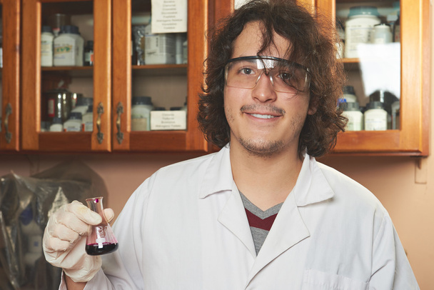 young chemist  in googles  - Photo, Image