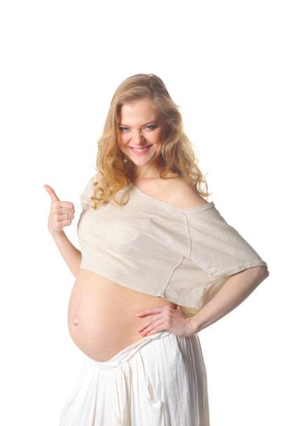 pregnant woman thumbs up  - Fotó, kép