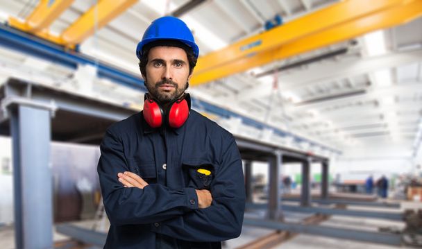 Man in an industrial facility - Foto, Bild