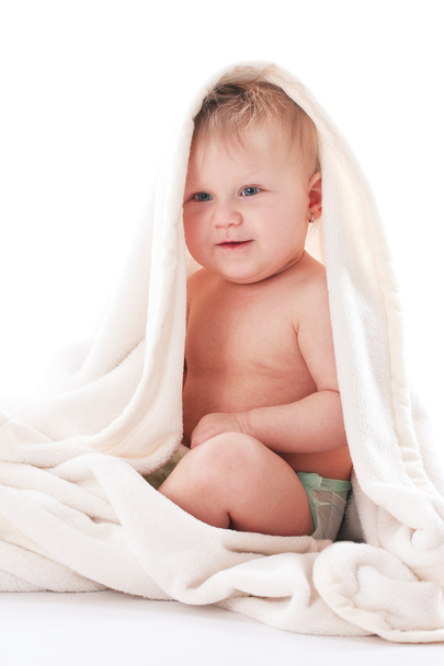 Adorable baby wrapped in white blanket - Photo, image
