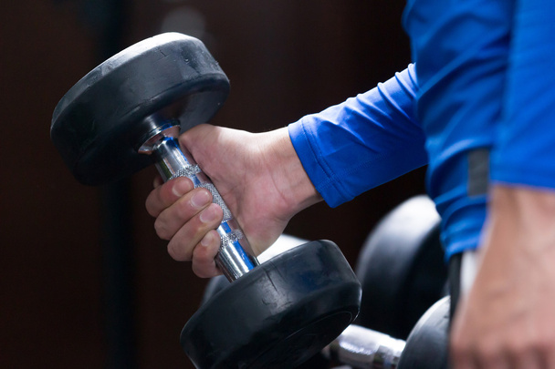 man working out in modern gym - Foto, imagen