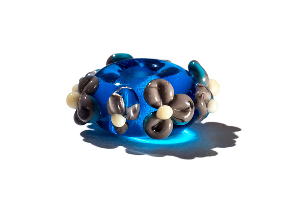 Hand made blue and grey glass bead - Photo, Image