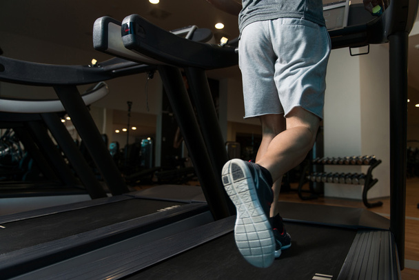 Close-Up Man Feet On Treadmill - Fotografie, Obrázek