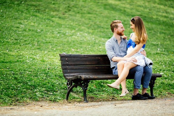 Romantic couple in park - Φωτογραφία, εικόνα