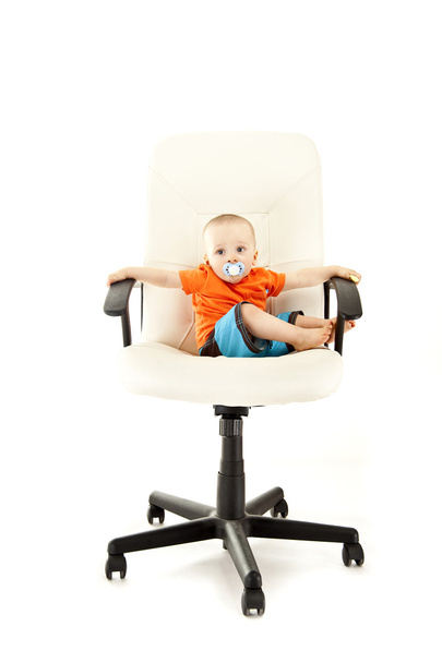 Baby on chair - 写真・画像