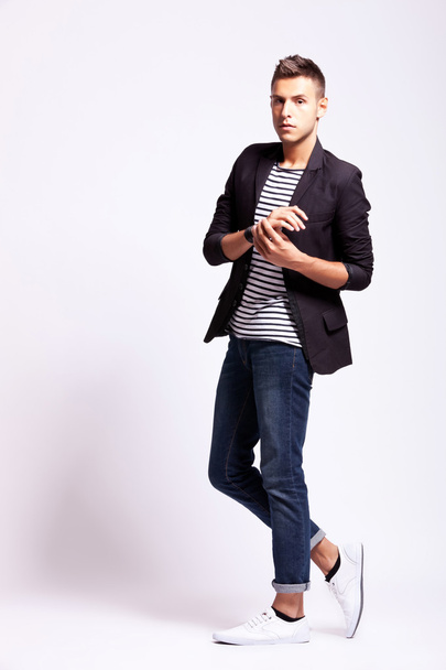 Young fashion man in a pose - Foto, Imagen