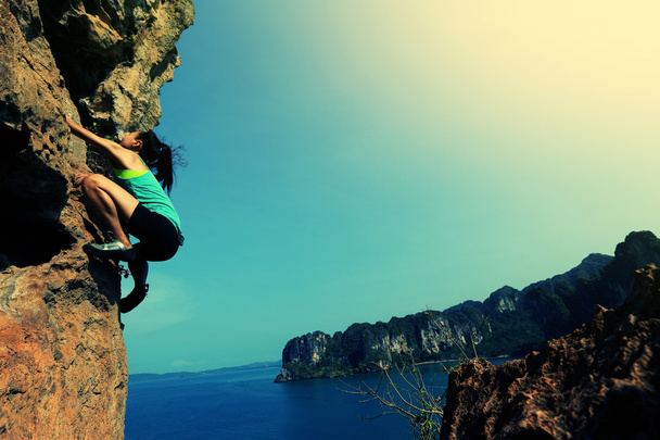 Mujer escalador de roca
 - Foto, Imagen