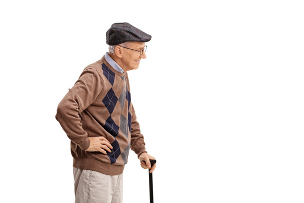 Senior gentleman with cane  - Фото, изображение