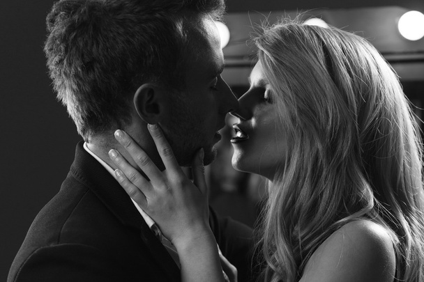 Attractive kissing couple - Photo, image