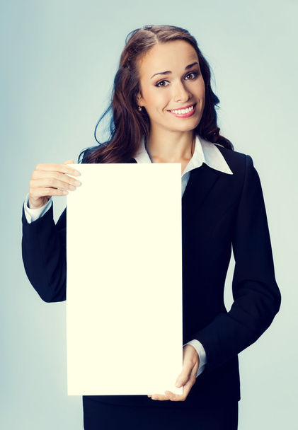 businesswoman showing blank signboard - Φωτογραφία, εικόνα