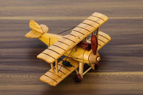 wood model airplane on desk - Φωτογραφία, εικόνα
