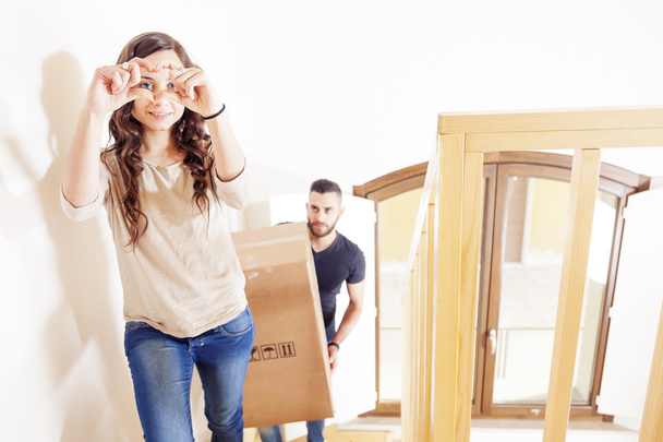young couple furnishes the new apartment after moving - Photo, Image