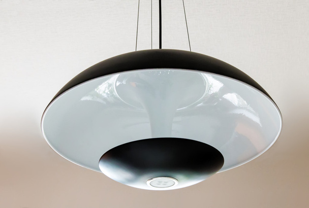 Elegant ceiling lamp with glass lampshade. - Photo, Image