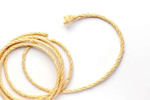 coiled rope on a white background close up - Фото, зображення