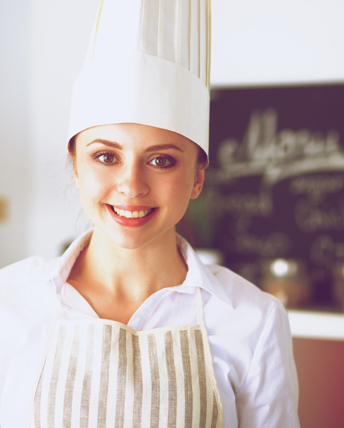 Chef woman portrait with  uniform in the kitchen - Zdjęcie, obraz