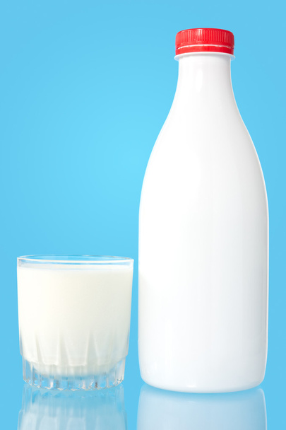 Bottle and glass of fresh milk - Fotó, kép