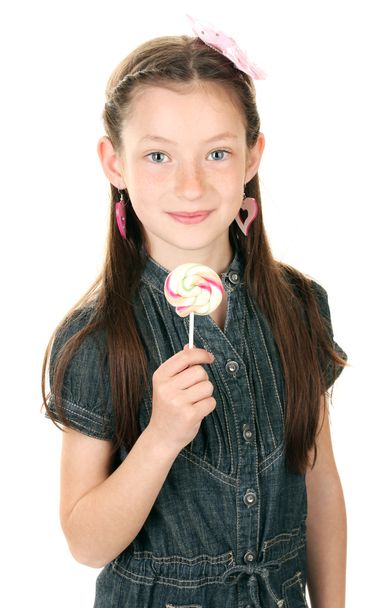 Portrait of beautiful little girl with lollipop isolated on white - Foto, afbeelding