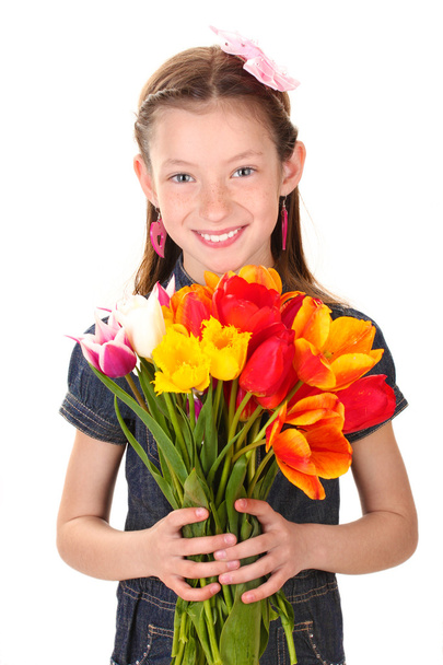 Portrait of beautiful little girl with tulips isolated on white - Foto, Bild