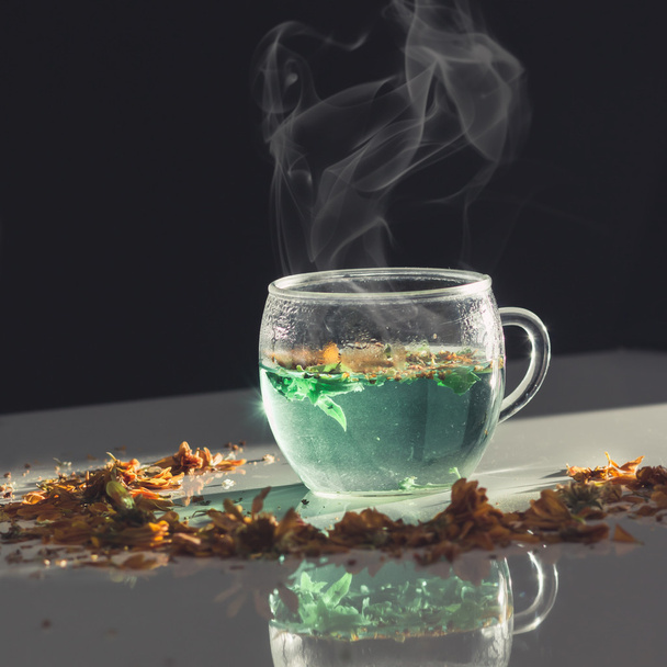  herbal tea in glass cup - Фото, изображение