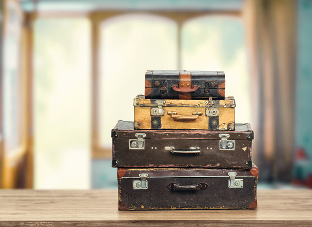 old-fashioned suitcases on table  - Foto, Imagen