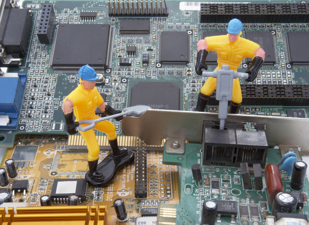 Travailleur de réparation de pièces d'ordinateurs 3
 - Photo, image