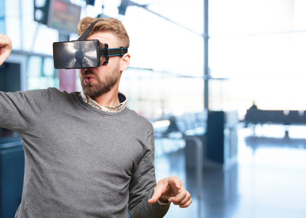 blond man with virtual glasses - Foto, afbeelding