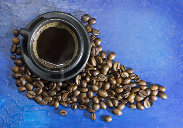 Šálek horké kávy na staré modré pozadí - Fotografie, Obrázek