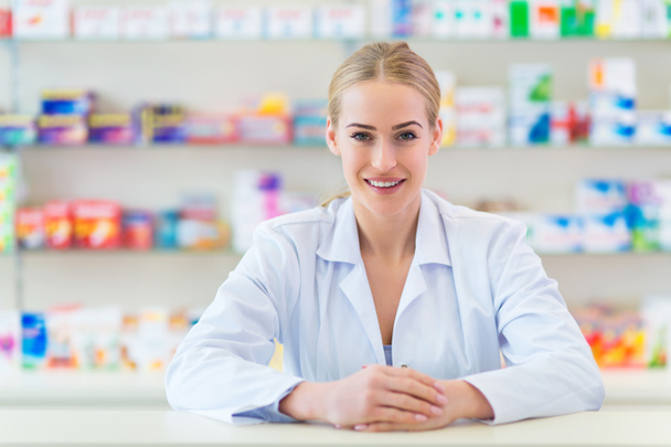 Female pharmacist smiling - Photo, Image