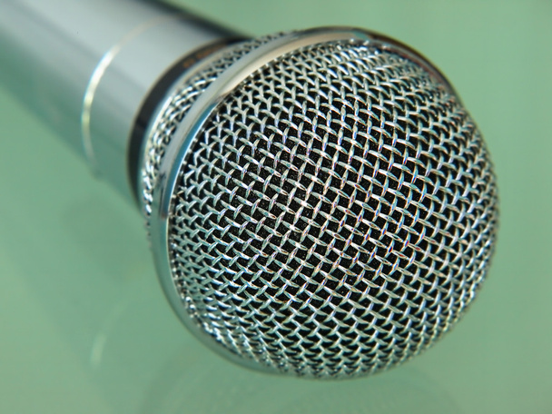 Silver metallic microphone taken closeup. - Photo, Image