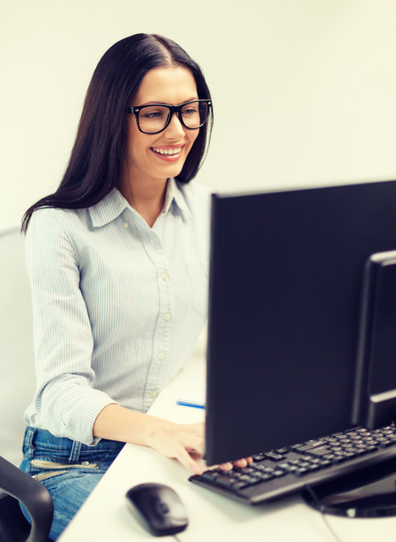 smiling businesswoman or student with eyeglasses - Foto, imagen