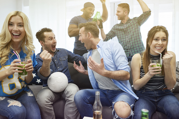 Friends watching soccer match  - Фото, зображення