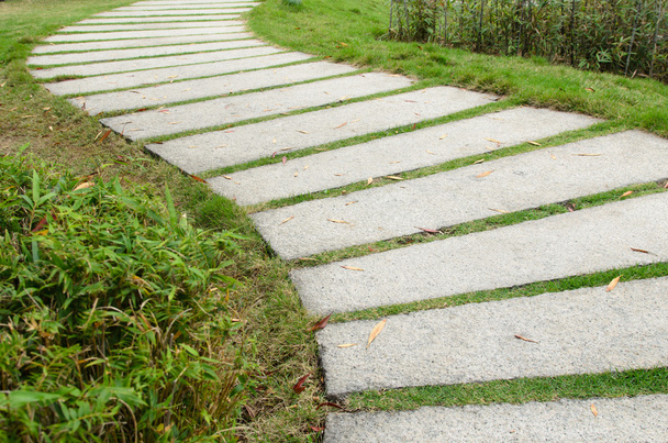 Stone pathway on grass - Photo, Image