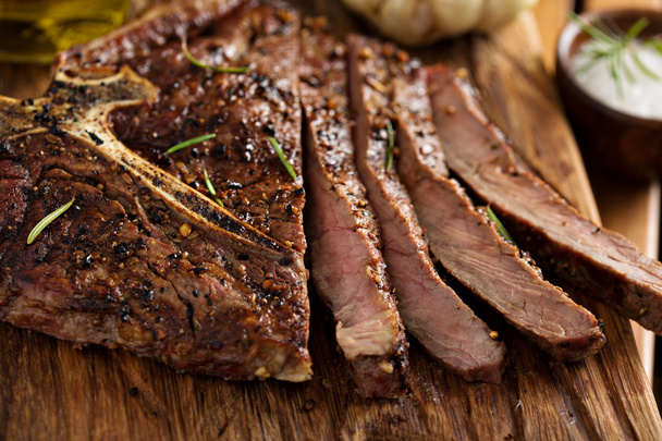 Beef steak cooked on a grill - Photo, Image
