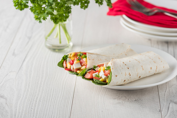 vegan tofu wraps with pepper, corn, tomatoes and spinach  - Photo, Image