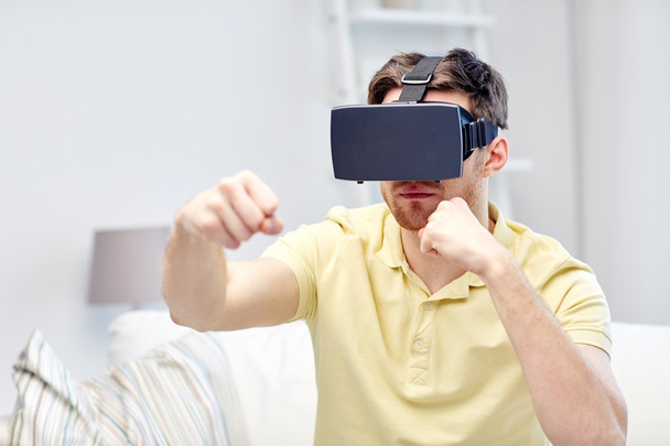 young man in virtual reality headset or 3d glasses - Фото, зображення