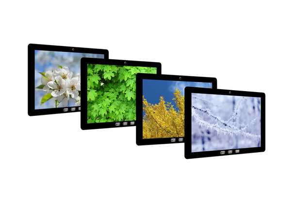 четыре планшетных компьютера с изображениями сезонов
 - Фото, изображение
