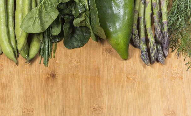 green vegetables on the top - Фото, изображение