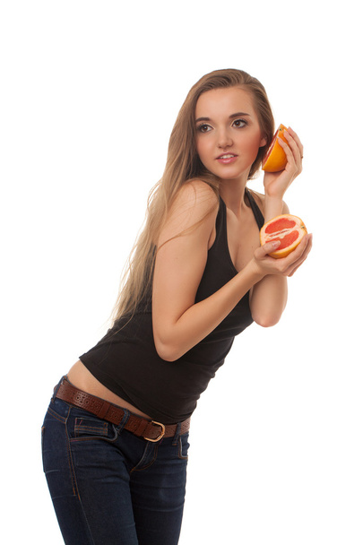 young beautiful girl with grapefruit in hand isolated on white background - Fotoğraf, Görsel