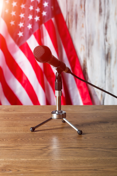 United States flag and microphone. - 写真・画像