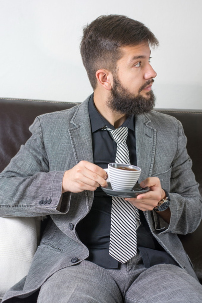 hombre de negocios con una taza de café - Foto, imagen