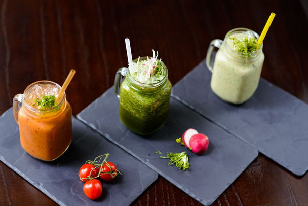 Three vegetable cocktails with Straws and garnishes - 写真・画像