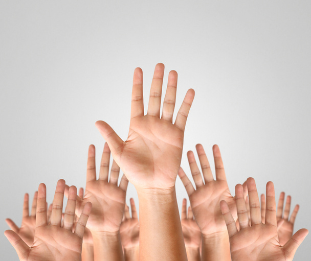 Closeup men and women raising hands  - Photo, Image