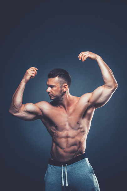 Strong Athletic Man Fitness Model Torso showing six pack abs. is - Φωτογραφία, εικόνα
