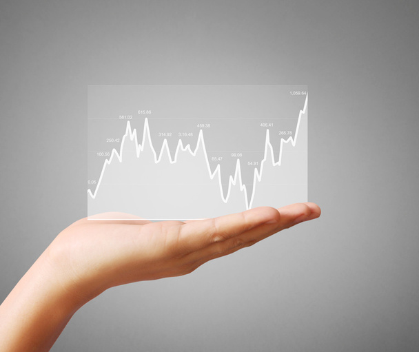  stock financial graph in hand - Photo, Image