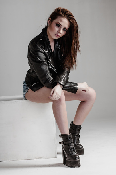 young pretty sexy woman in leather jacket - Foto, imagen