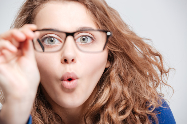Closeup portrait of a young woman in glasses - Foto, imagen